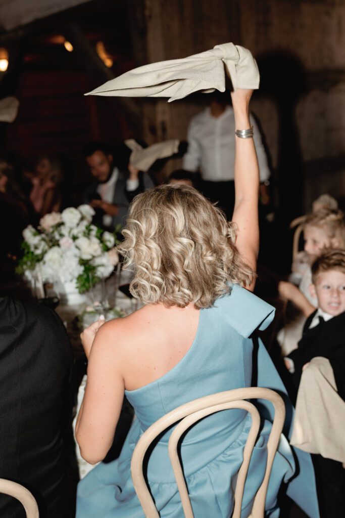table scapes and details of the reception space, white florals and greens with overhead lighting and pattern table cloths olympias valley estate in petaluma california, wedding photography by alyssa gayle photography based in san francisco california and traveling worldwide