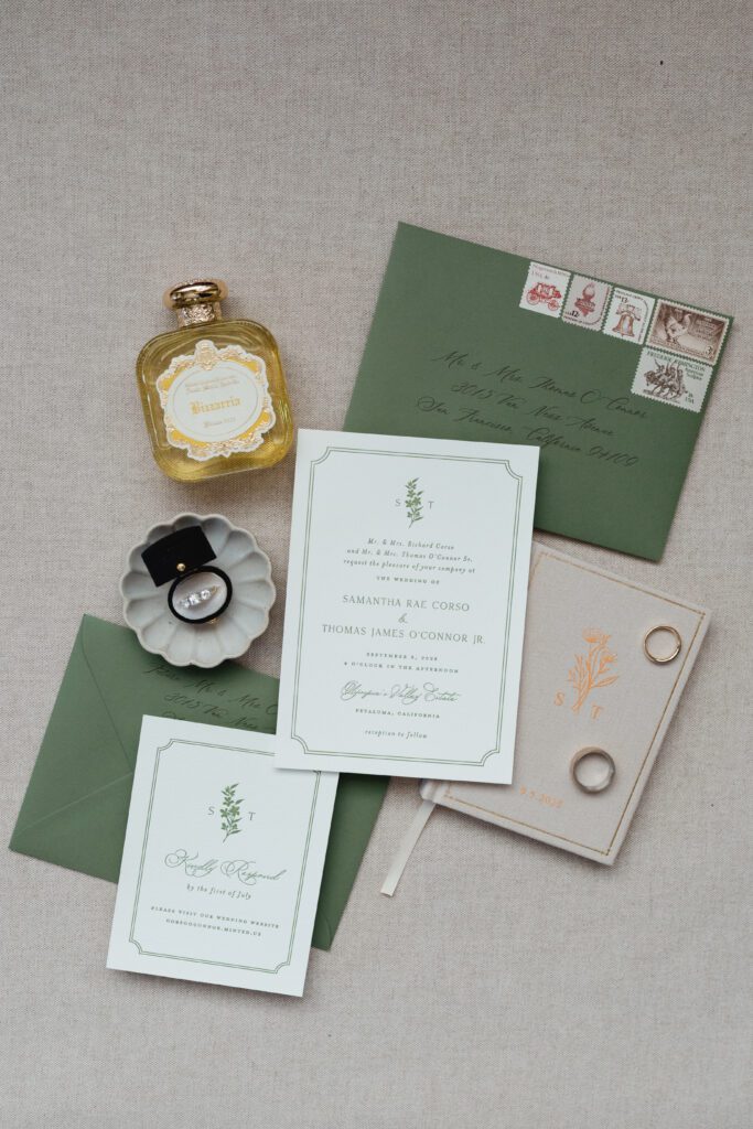 Flat lay invitation suit at olympias valley estate in petaluma california, wedding photography by alyssa gayle photography based in san francisco california and traveling worldwide