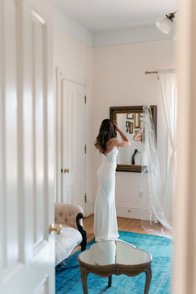 bride in her dress getting ready for the wedding to begin olympias valley estate in petaluma california, wedding photography by alyssa gayle photography based in san francisco california and traveling worldwide