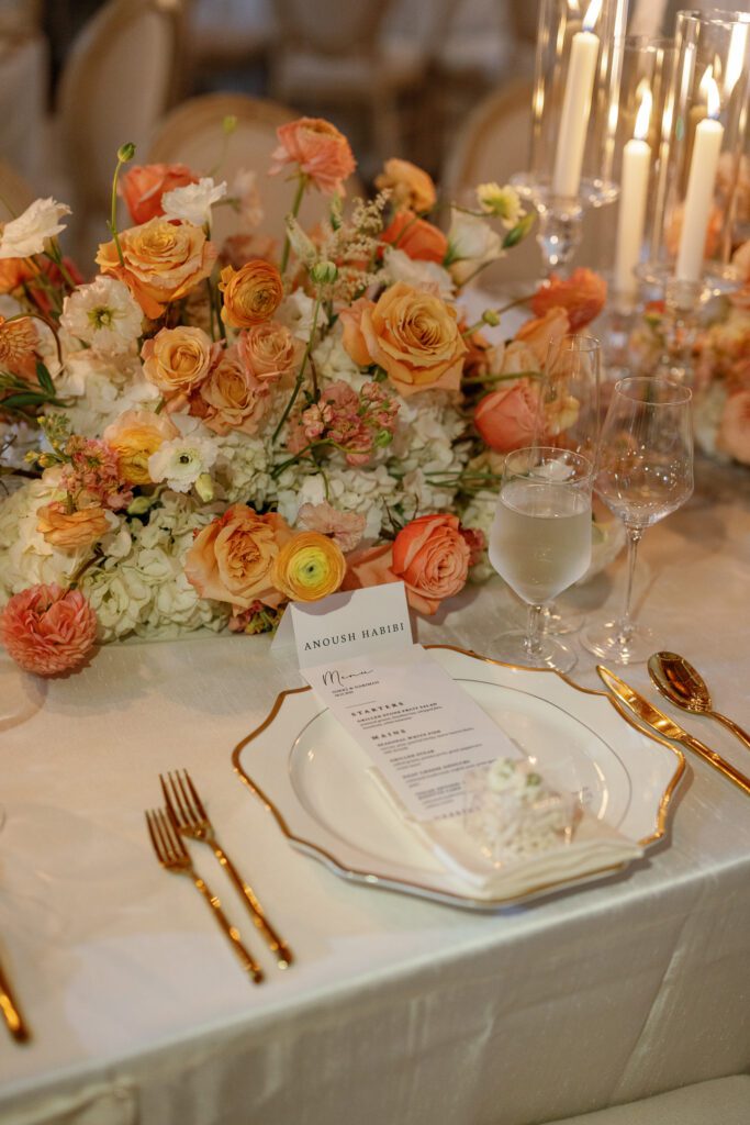 Elegant wedding table setting with floral centerpiece by Florals by Hamid at Jacuzzi Winery
