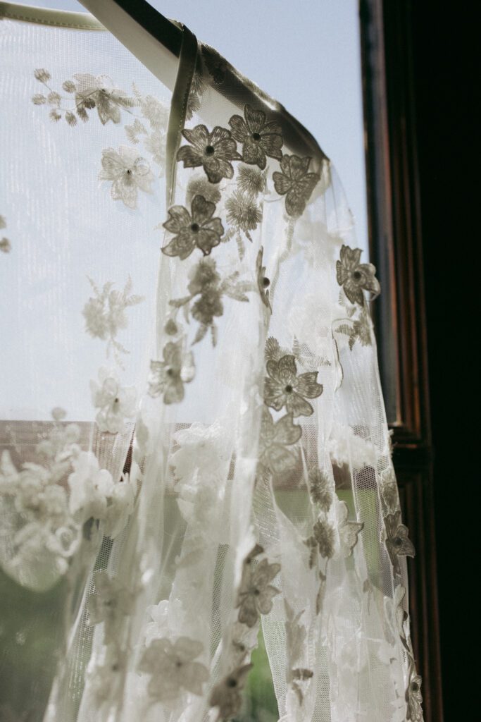 Detailed lace wedding veil photographed in natural light at Jacuzzi Winery

