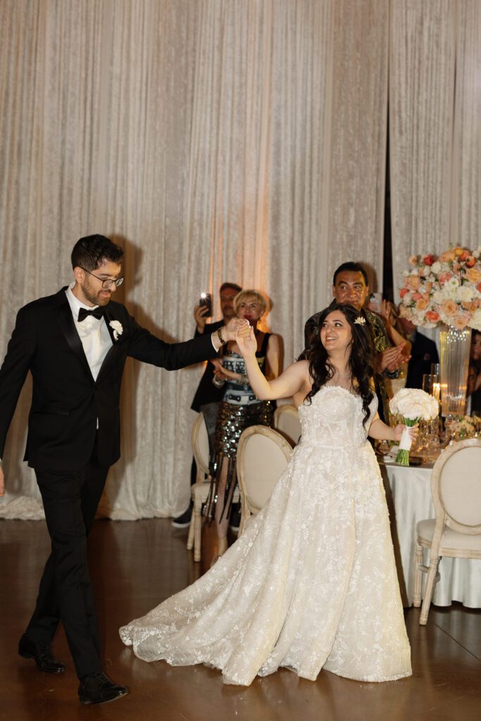Bride and groom dancing together during wedding reception at Jacuzzi Winery
